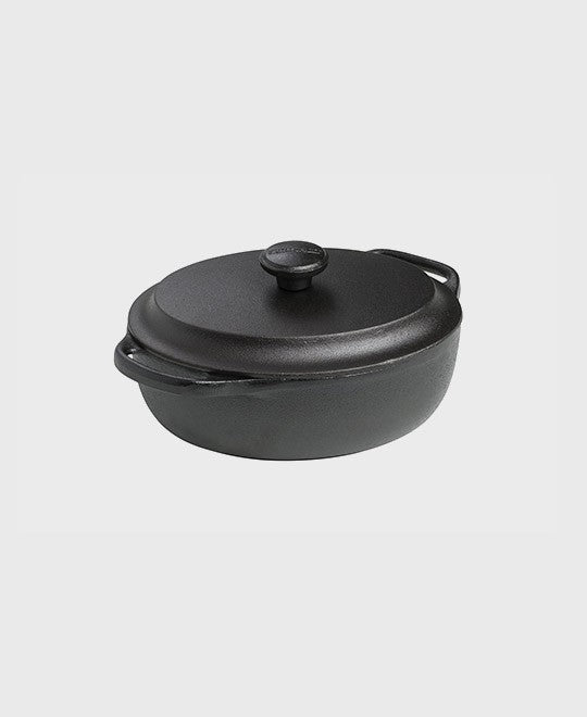 Black cast iron casserole 2 L oval with iron lid and two iron handles