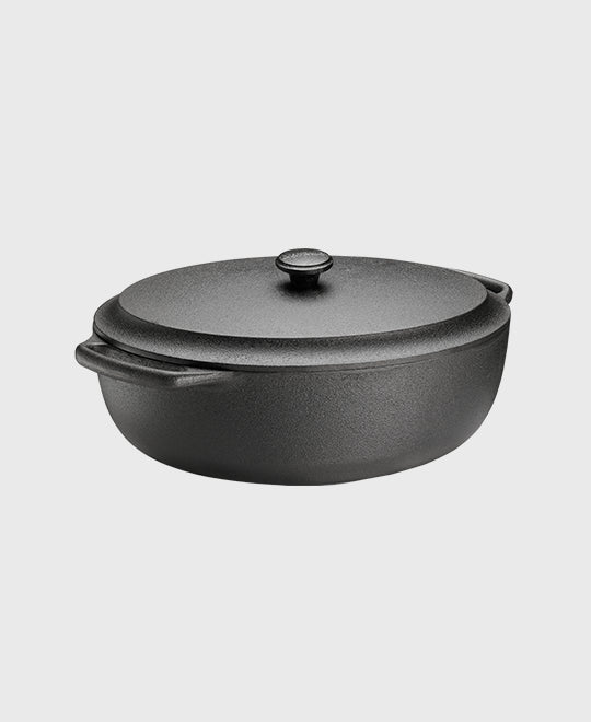 Black cast iron casserole 6 L oval with iron lid and two iron handles