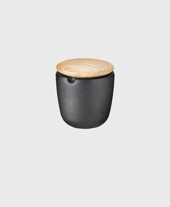 Black cast iron salt and spice bowl swing with oak lid