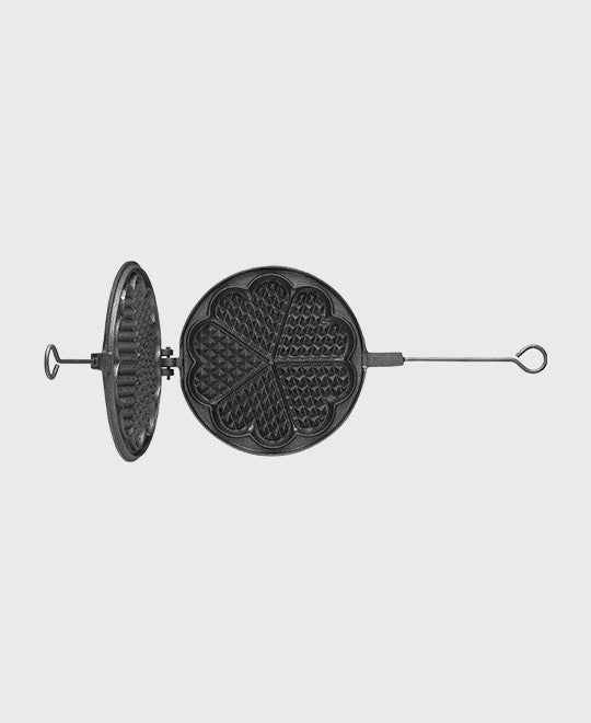 Open top view of Skeppshult Cast Iron waffle iron 21 cm, whowing the seasoned cooking surface