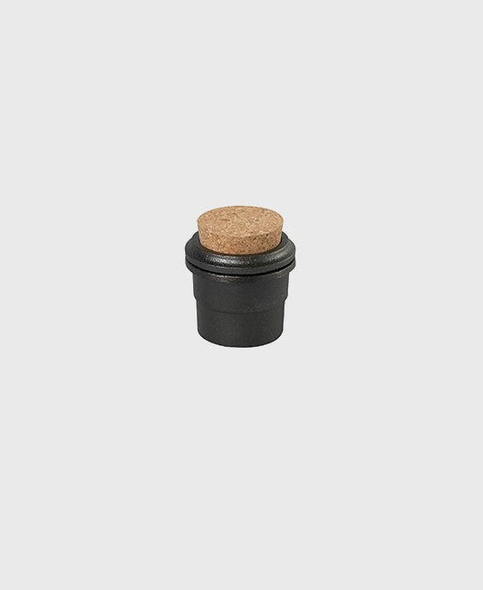 Black cast iron spice mortar and storage jar with cork lid, ideal for pepper and dry herbs