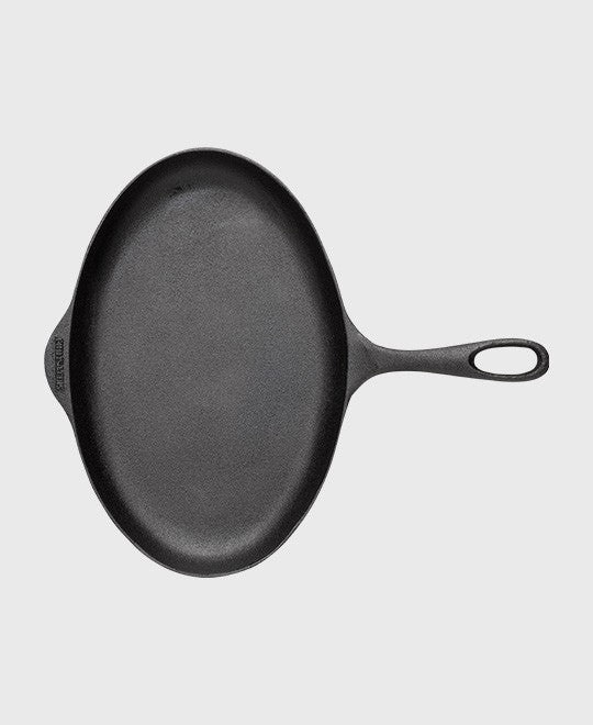 Black cast iron fish pan oval 33x21,5 cm with iron handle