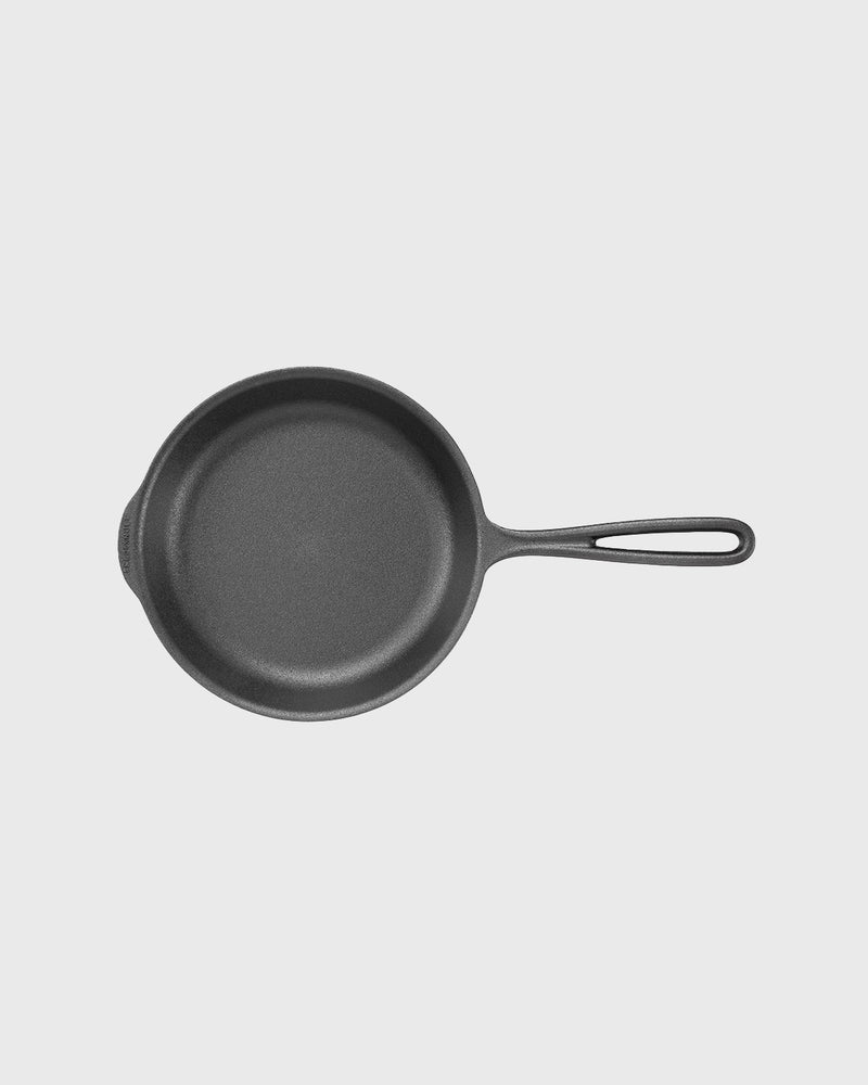 Black cast iron frying pan round 20 cm with iron handle