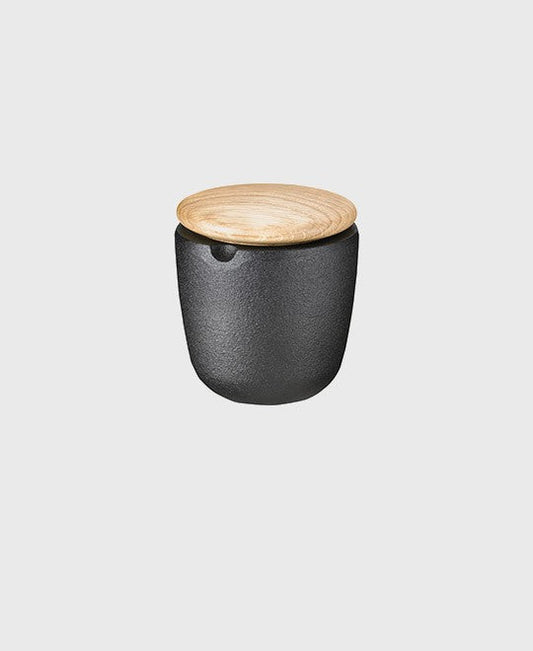 Black cast iron salt and spice bowl swing with oak lid