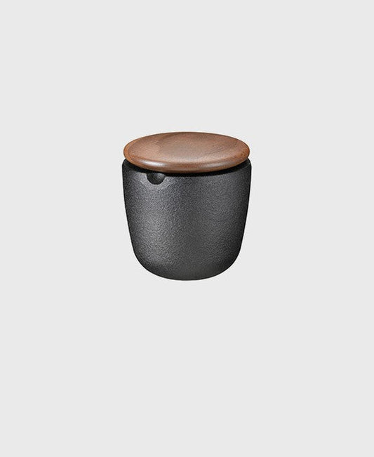Black cast iron salt and spice bowl swing with walnut wood lid