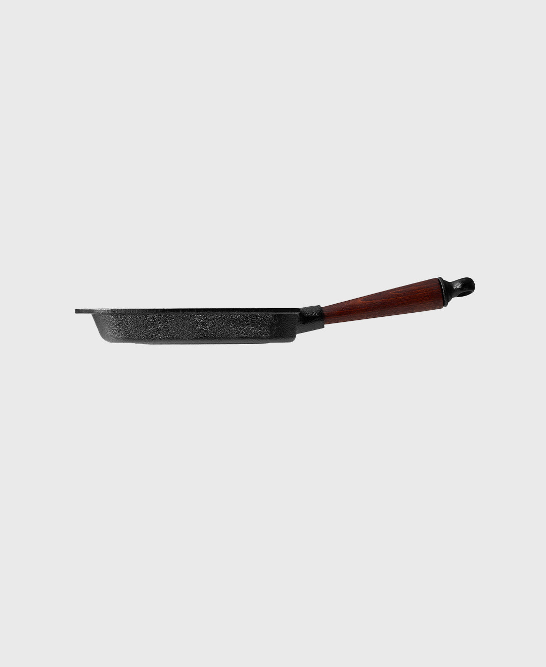 Black cast iron tamagoyaki rectangular frying pan with beechwood handle