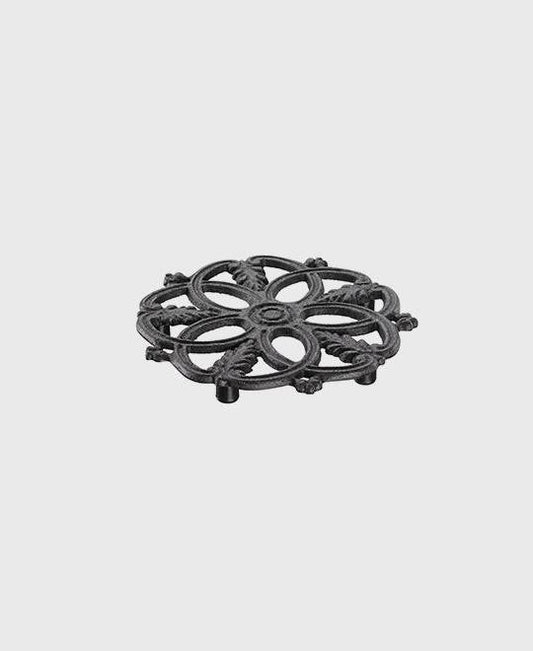 Black cast iron trivet 20 cm round with decorative pattern